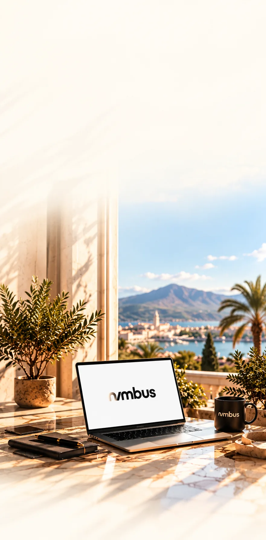 Portátil con el nombre de Nimbus en una terraza con vistas al mar